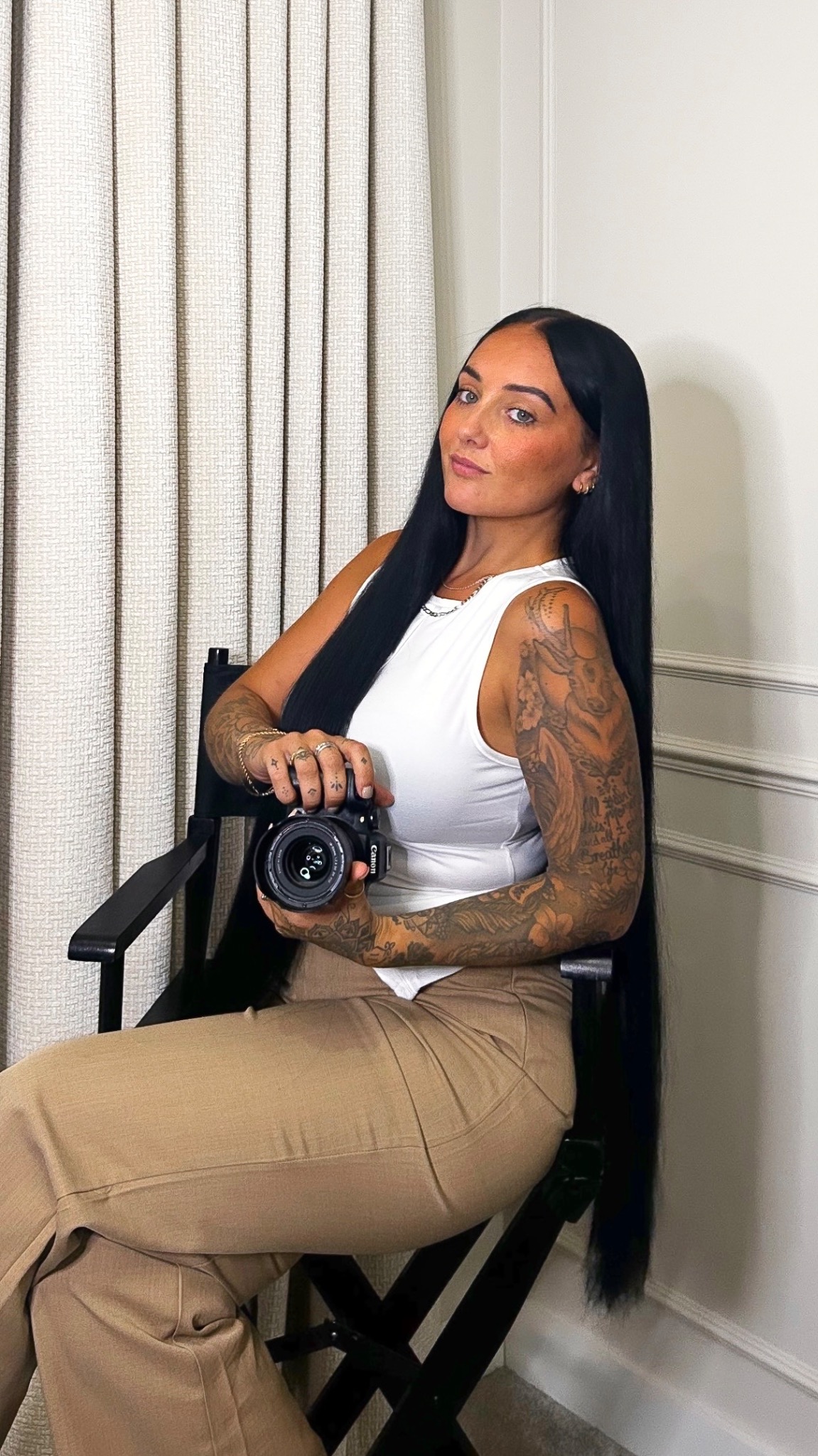 Penny Kay holding her camera